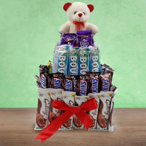 Fabulous 4 Tier Tower Arrangement of Mixed Chocolates n Teddy