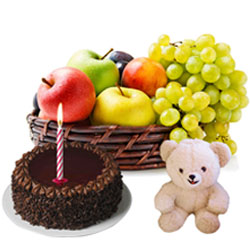 Delectable Chocolate Cake with Fruits Basket Teddy and Candles