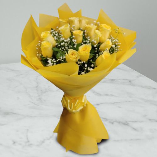 Lovely Tissue Wrapped Bouquet of Yellow Rose with baby breath filler