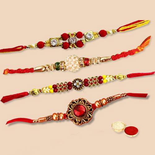 Gorgeous Set of 4 pc. Captivating Rakhi with free Roli Tilak and Chawal for your Precious Brother on the Occasion of Rakhi